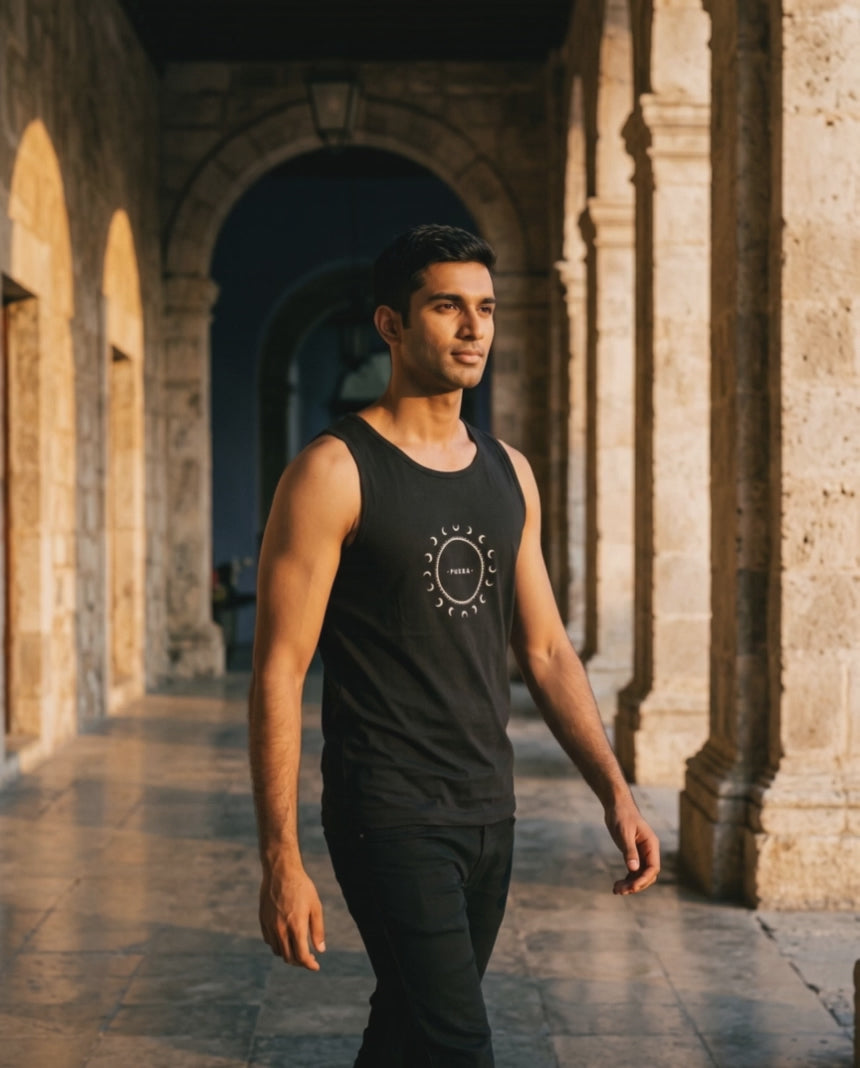 Crescent Tank — colonnade film, moon-phase emblem in golden hour