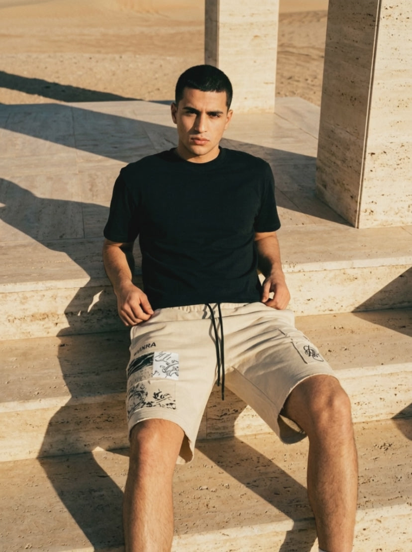 Atlas Shorts — travertine steps film, low desert sun