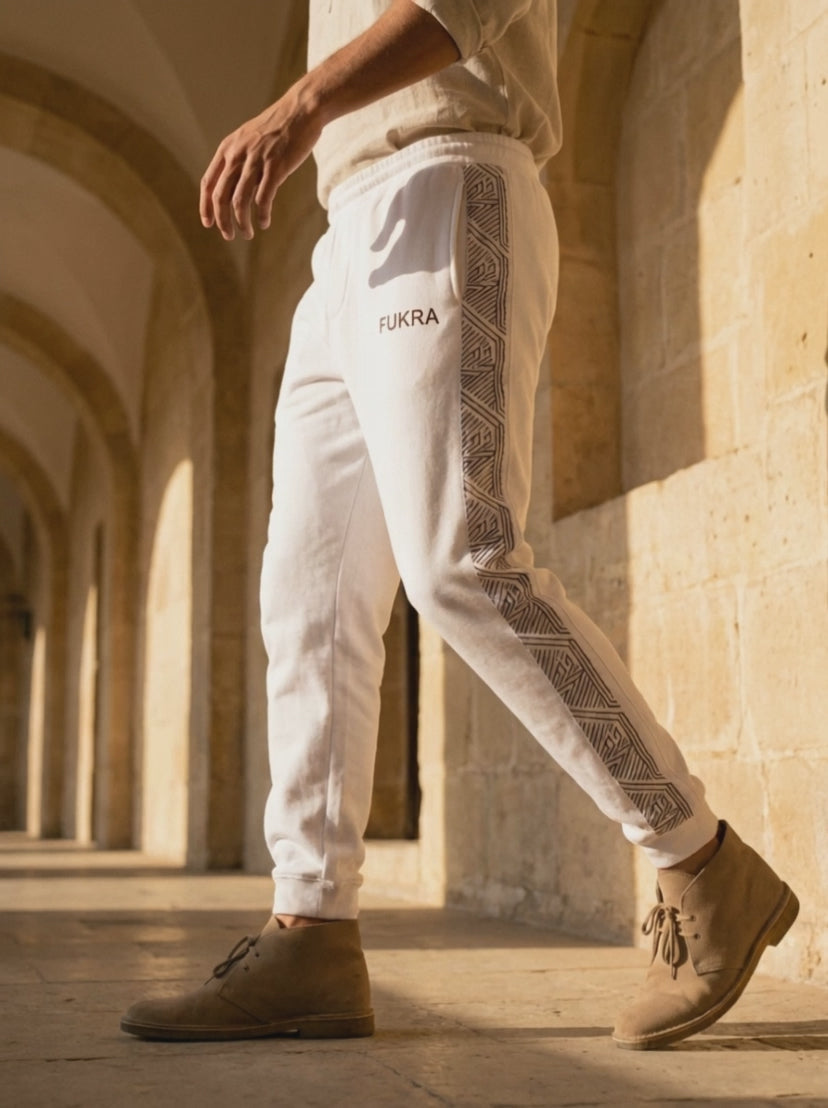 Geometry Joggers in bone white — walking the limestone corridor