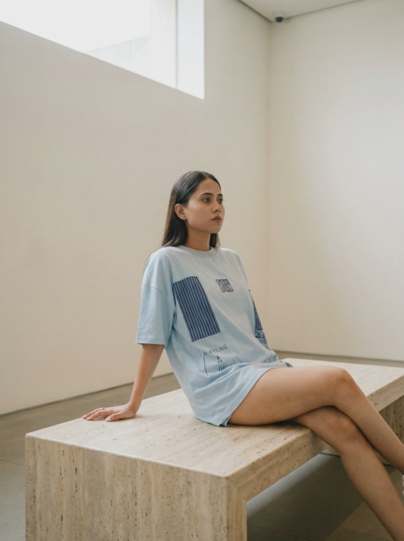 Patch Tee in glacier blue — gallery bench film, museum light